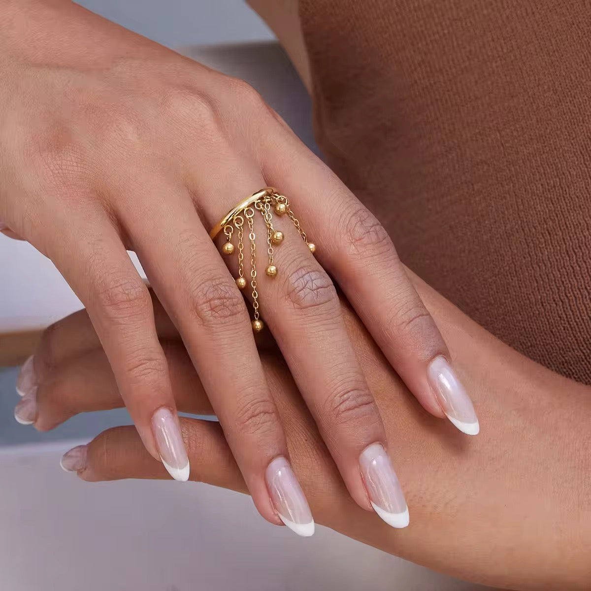 Golden fringe fall ring